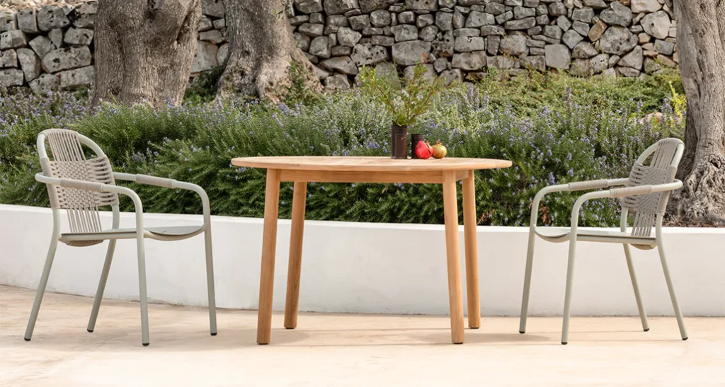 sam dining table is a contemporary outdoor dining table with teak structure and is suitable for hospitality and contract projects.