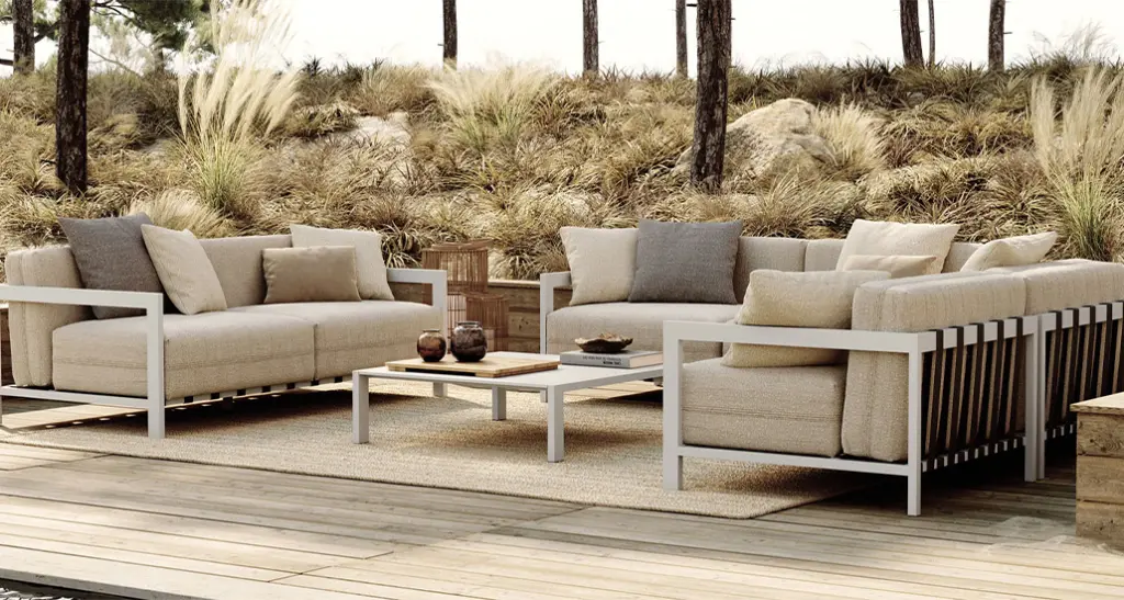 bondi collection is a contemporary outdoor collection with sofa and chaise lounge and is made of steel frame and fabric upholstery and is placed in a hospitality contract outdoor space.