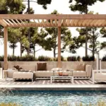 Bondi Collection is a contemporary outdoor collection with sofa and chaise lounge and is made of steel frame and fabric upholstery and is placed in a hospitality contract outdoor space.
