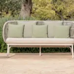 kodo lounge sofa is a contemporary outdoor lounge sofa with aluminium and rope frame and is placed in hospitality contract outdoor space.