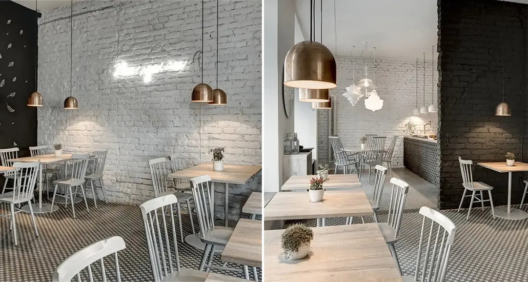 ironica chair is a contemporary dining chair with wood structure and is suitable for contract and hospitality spaces. In this image grey Ironica is placed in a restaurant.