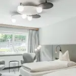 circ ceiling lamp contemporary ceiling lamp with glass and metal suitable for hospitality and contract spaces.