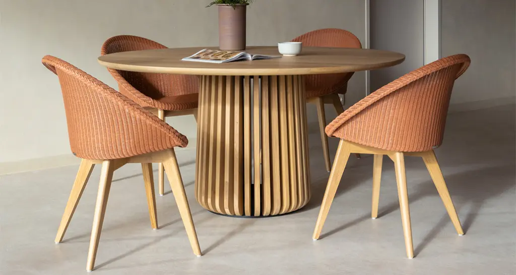 Joe dining chair oak base is a contemporary lloyd loom dining chair with aluminium frame and oak base and is suitable for hospitality and contract spaces. Joe is placed here in a residential space.