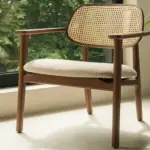 titus lounge chair is a contemporary lounge chair with oak and rattan frame and is suitable for hospitality and contract spaces.
