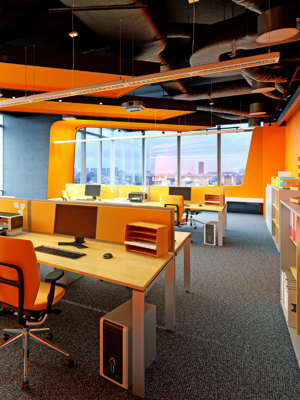 office fit out design and build done for office workstation space consisting of task chairs, work desk with a orange colour combination for walls, work desk and task chair.